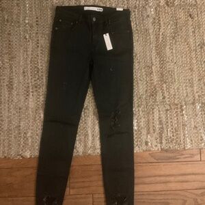 Lovers and Friends distressed black skinny jeans size 27.  NWT.